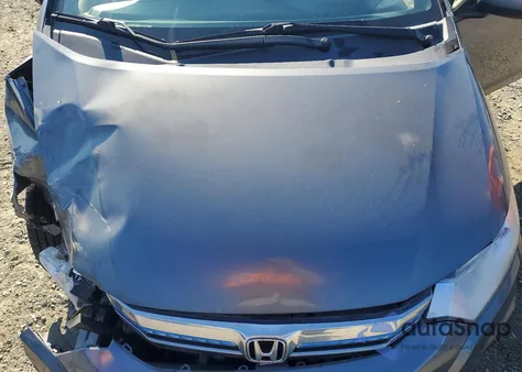 2013 Honda Insight Lx z USA, uszkodzony, nr VIN JHMZE2H52DS001681